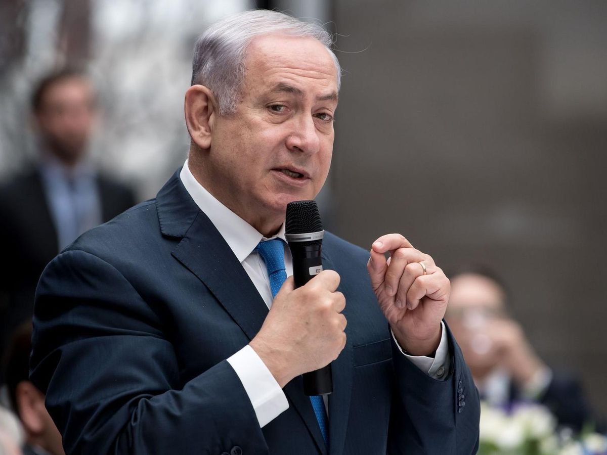 He's facing possibility of criminal charges, but Israel's Netanyahu acts as if nothing is amiss